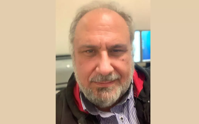 white and black ship surrounded by body of water